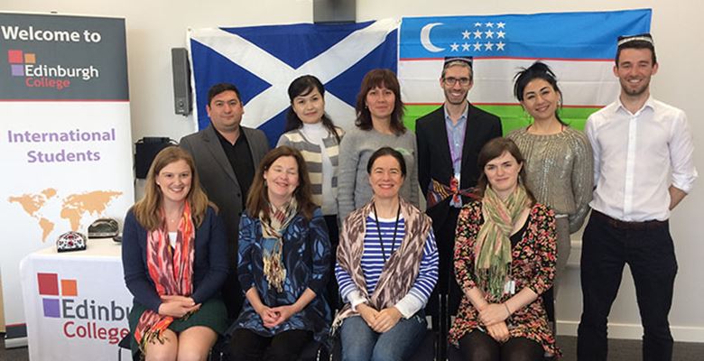 Edinburgh College International team and representatives from Uzbekistan posing for a photo.