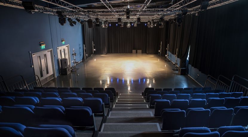 Theatre at Edinburgh College, showing tiered seating, stage area and lighting.