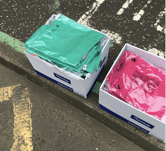 Boxes of colourful scrubs.