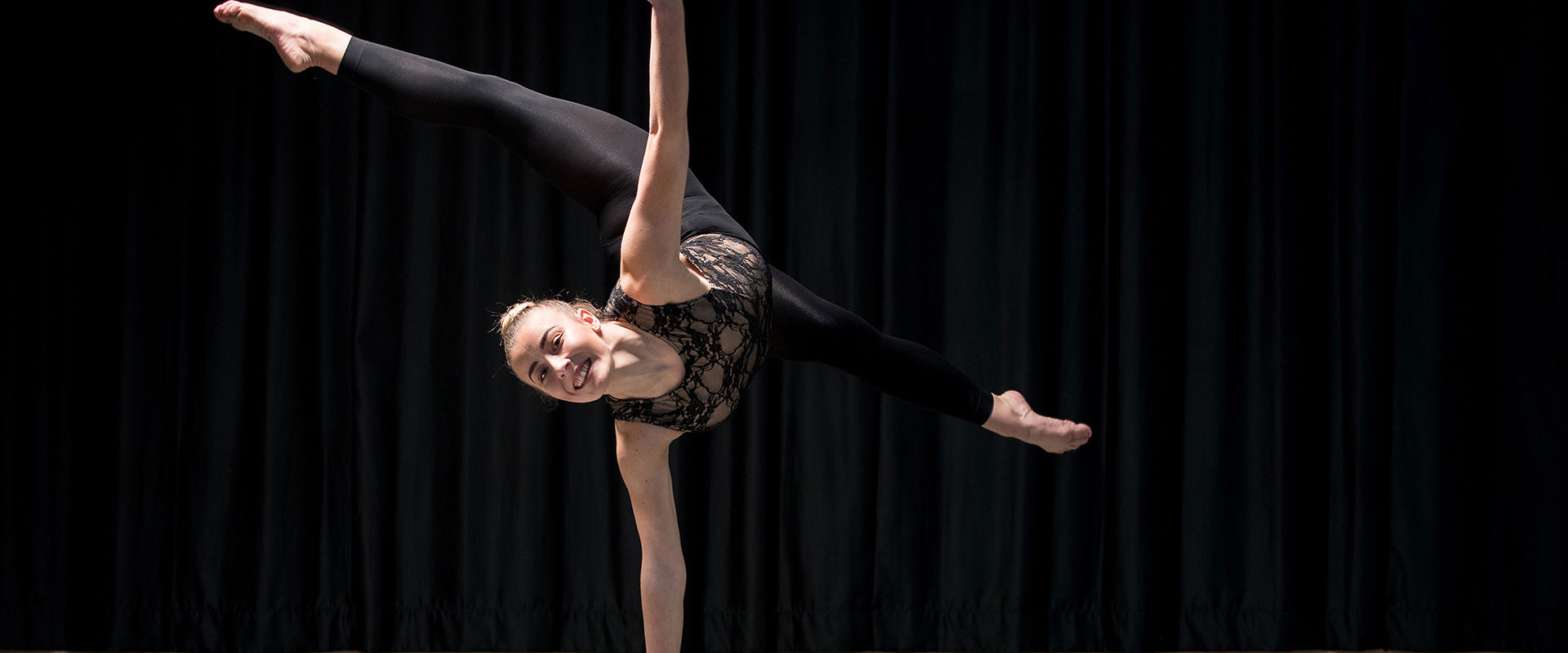 Performing Arts student dancing in a studio.