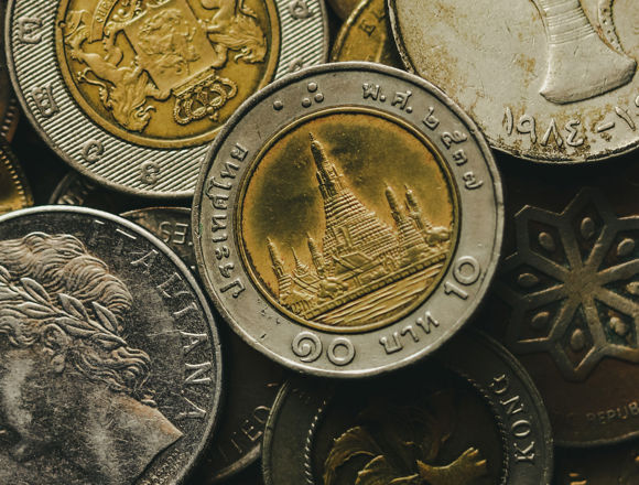 Mixture of coins in different currencies.