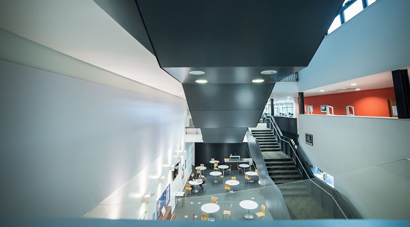 Communal space with tables and chairs at Midlothian campus